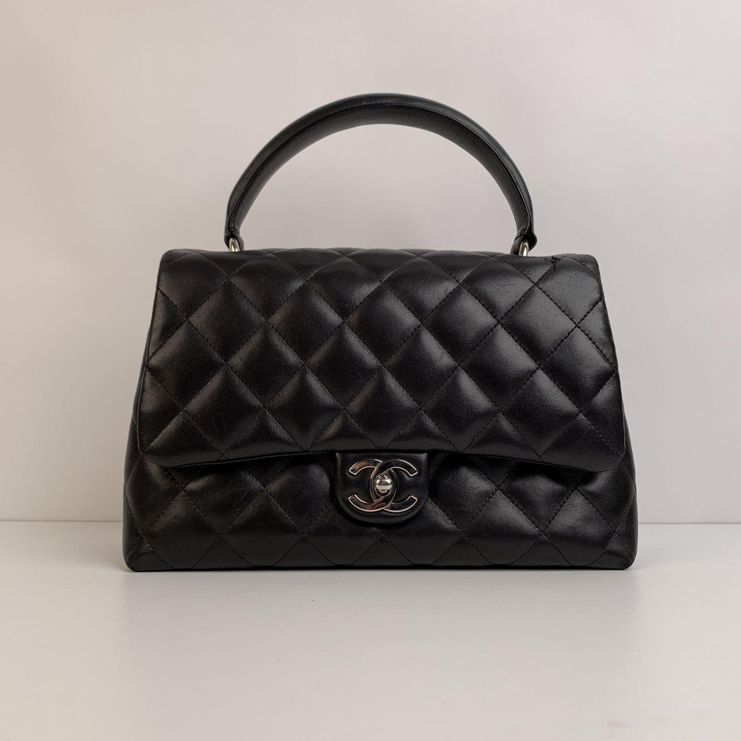 Beautiful CHANEL 'Kelly Flap Bag', from the 2005-2006 collection. Crafted in quilted leather, in black color. It features a flap front with silver metal CC - CHANEL turn lock closure and top carry handle. The bag is lined in burgundy leather and it