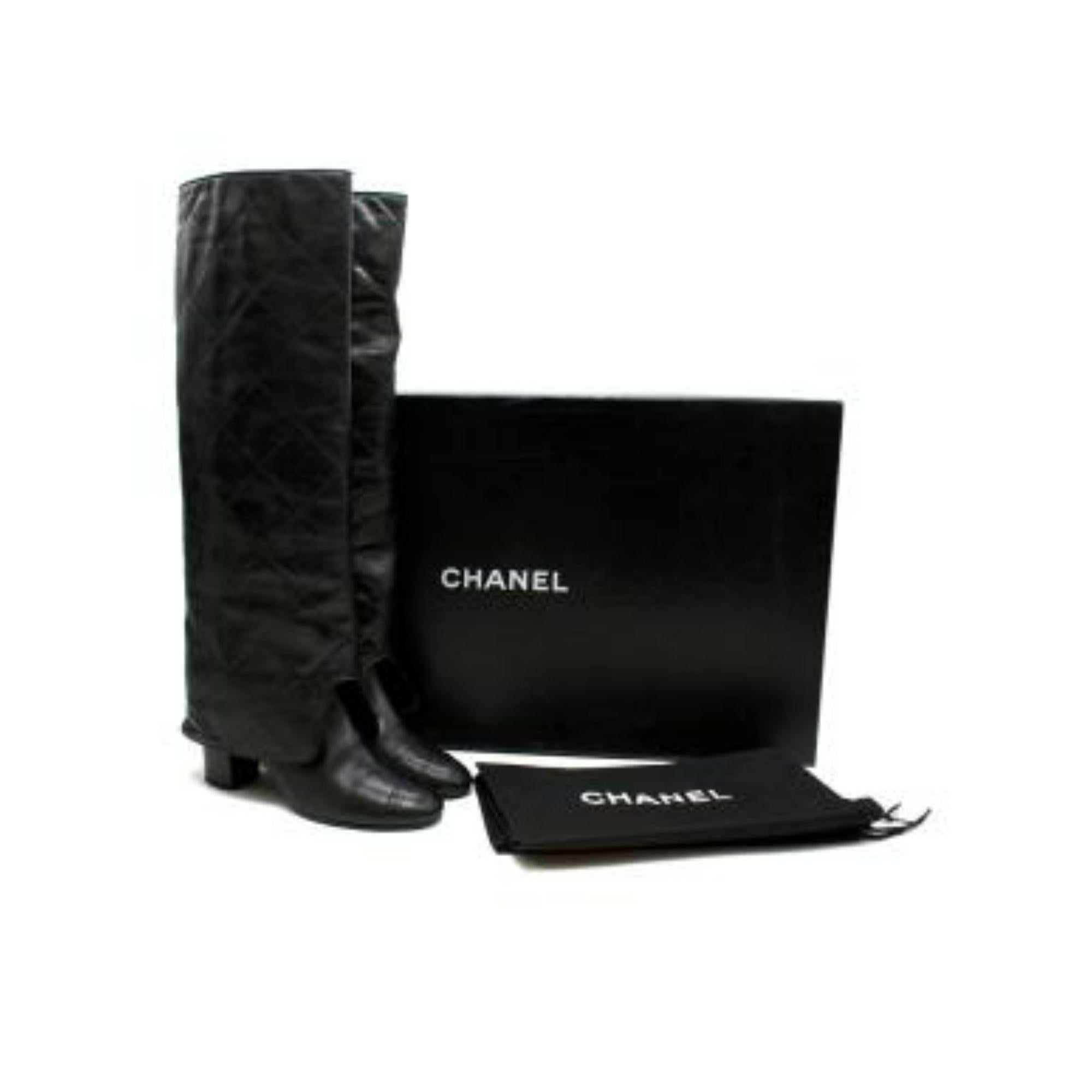 Chanel Black Quilted Leather Knee-high Boots

- Round toe
- Block heel
- Quilted body
- Signature CC logo on heel
- Knee-high

Material
Leather

Made in Italy

9.5/10 Excellent condition

PLEASE NOTE, THESE ITEMS ARE PRE-OWNED AND MAY SHOW SIGNS OF