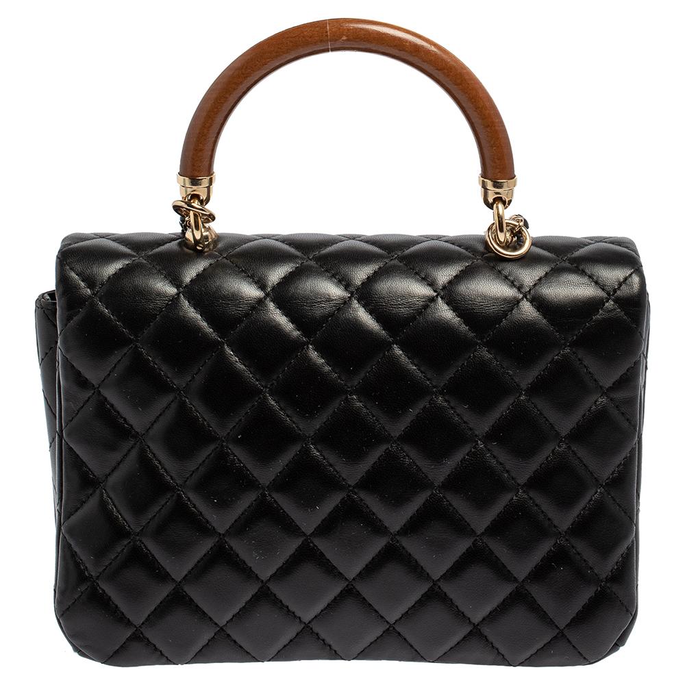 Chanel Schwarzes gestepptes Leder Klopfen auf Holz Top Handle Tasche Damen