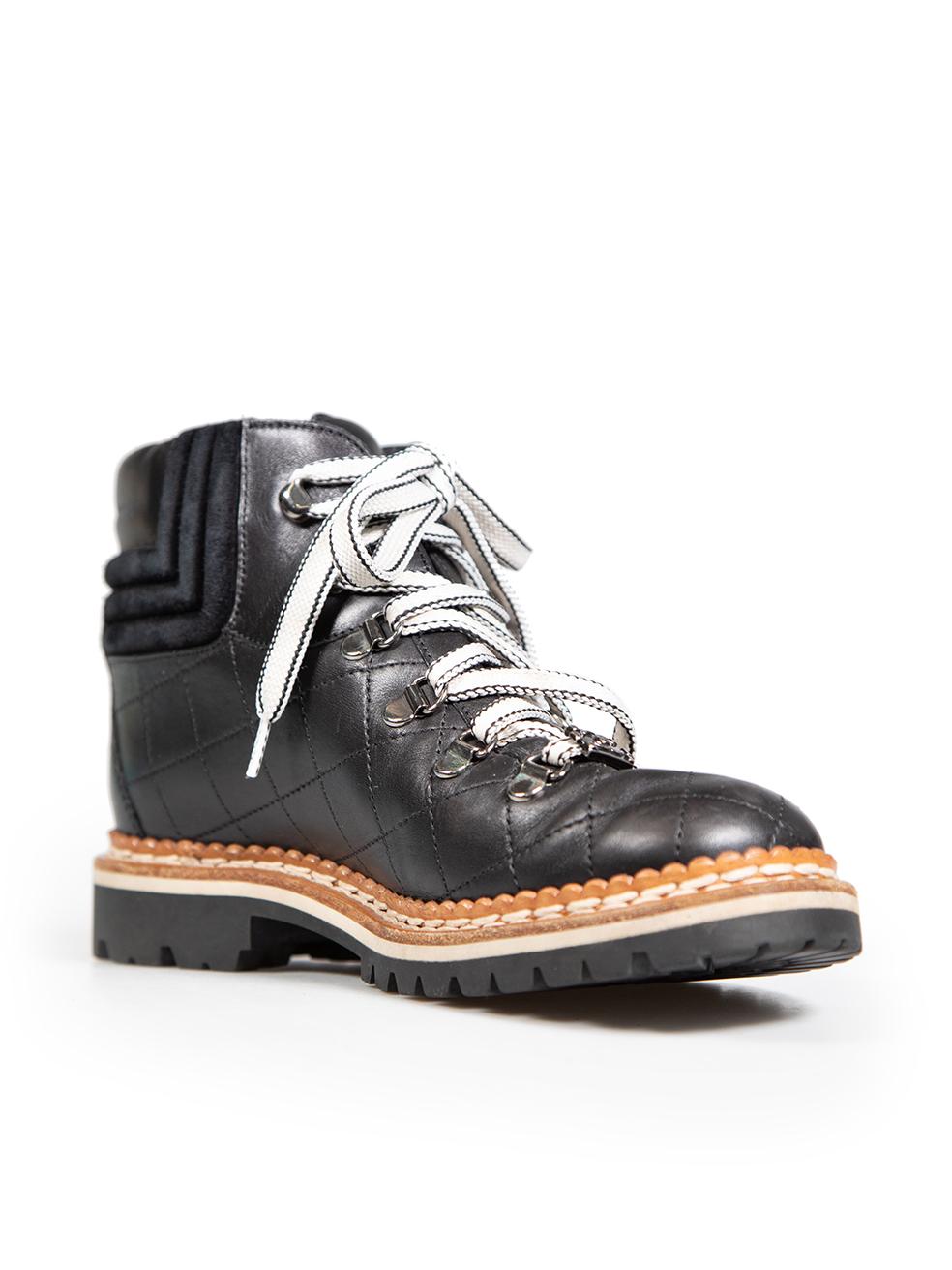 CONDITION is Very good. Minimal wear to the boots is evident, there is general to the leather around the front of the shoes and the tongue on this used Chanel designer resale item.
 
 Details
 Black
 Leather
 Ankle boots
 Quilted
 Round toe
 Lace up