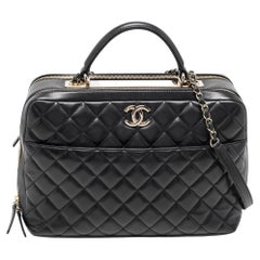 Chanel - Grand sac bowling en cuir matelassé noir « Trendy CC »