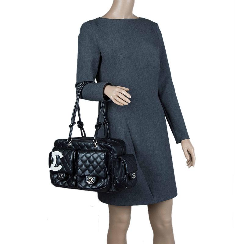 The Chanel Reporter bag has a huge fan following. This black leather purse draws inspiration from classic utility bags and has the iconic Chanel quilted pattern. It has abundant exterior multi-pockets with CC turnlock closures offering you absolute