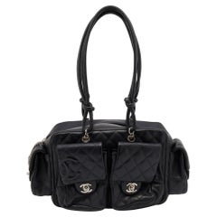 Chanel Reporter Cambon - For Sale on 1stDibs  chanel cambon, chanel ligne  cambon reporter bag, chanel cambon multi pocket reporter bag