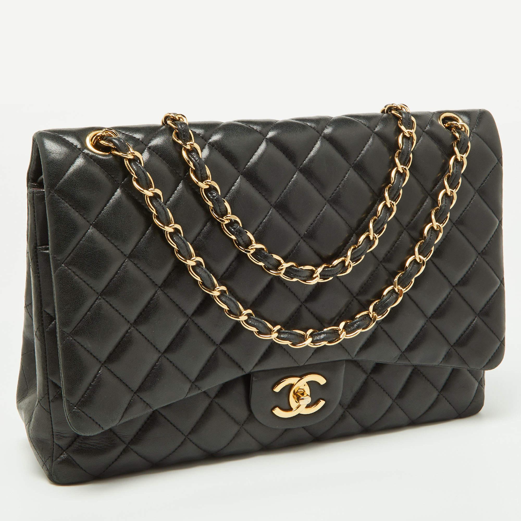 Chanel Black Quilted Leather Maxi Classic Double Flap Bag In Fair Condition For Sale In Dubai, Al Qouz 2