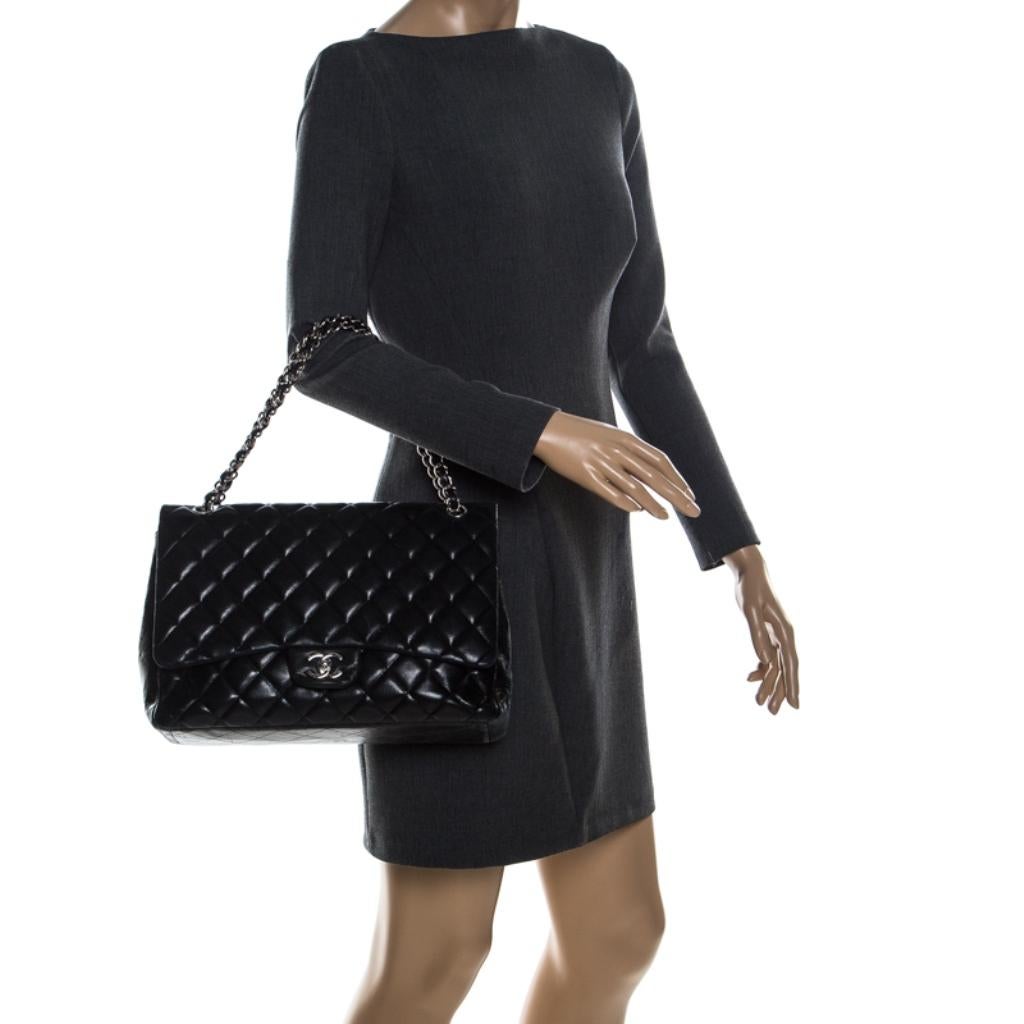 Chanel Black Quilted Leather Maxi Classic Single Flap Bag In Fair Condition In Dubai, Al Qouz 2