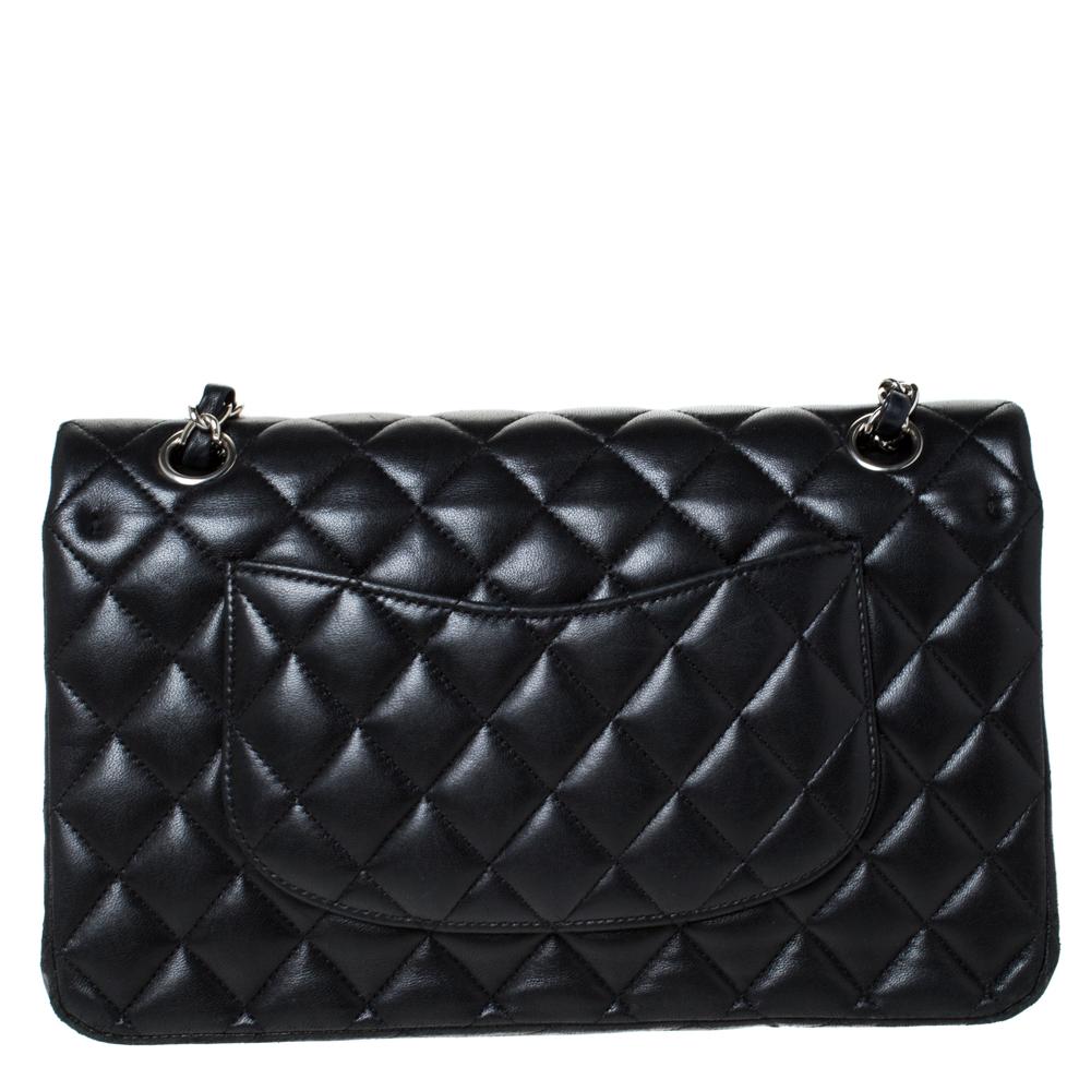We are in utter awe of this flap bag from Chanel as it is appealing in a surreal way. Exquisitely crafted from black leather in their quilt design, it bears their signature label on the leather interior and the iconic CC turn-lock on the flap. The