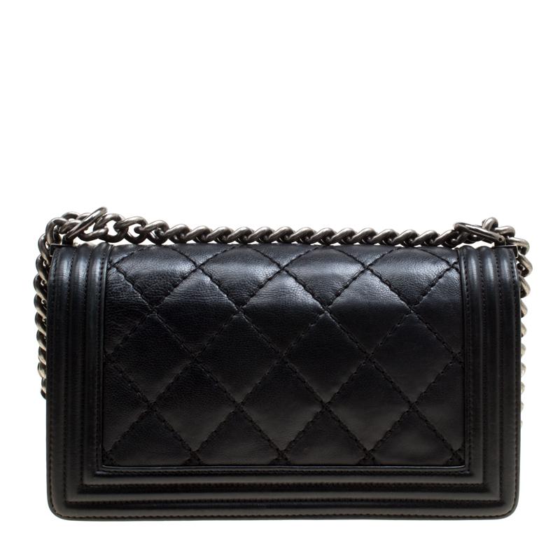 This flap bag from Chanel will make the dream of countless women come true. Continuing the grace and divinity of the Chanel classics, this Boy Flap bag comes crafted from black leather and designed with their signature quilt in wild stitch patterns.