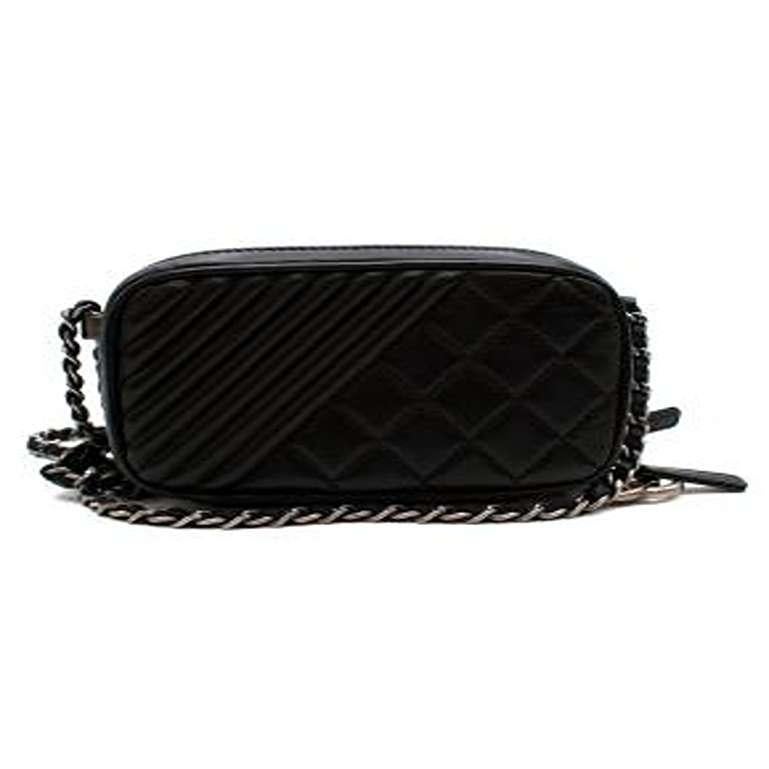 Chanel Black Quilted Leather Mini Crossbody Bag

- Double zipped mini box bag with gunmetal crossbody chain strap 
- Diamond and striped quilted smooth leather 
- Gunmetal CC logo charm 
- 2 compartments with card slots and zipped pockets 
- Maroon