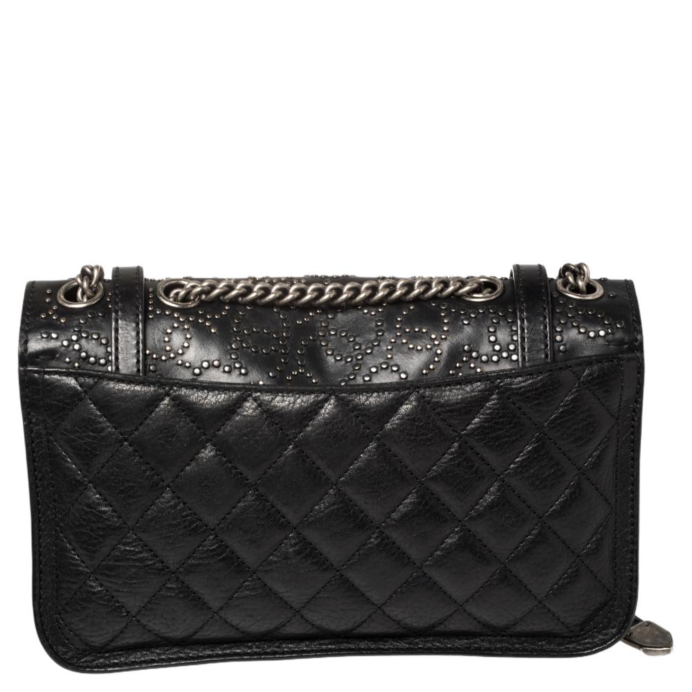 Adorned in a classic black hue, this Paris Dallas bag is a wow creation that carries the signature elegance and charm of Chanel accompanied by refreshing details. It is crafted from leather and features the characteristic quilted design all over