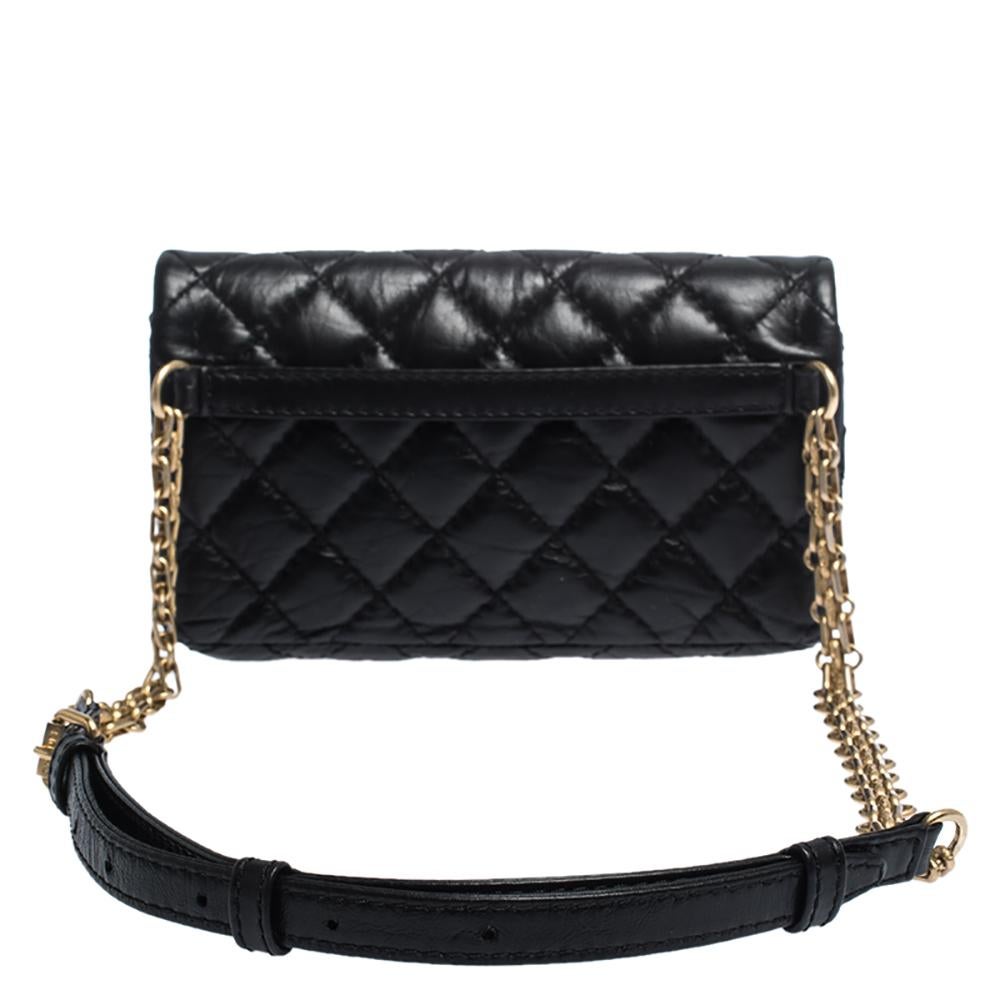 Chanel's Flap Bags are iconic and noteworthy in the history of fashion. Hence, this Reissue 2.55 is a buy that is worth every bit of your splurge. Exquisitely crafted from black leather, it bears their signature quilt pattern and the iconic
