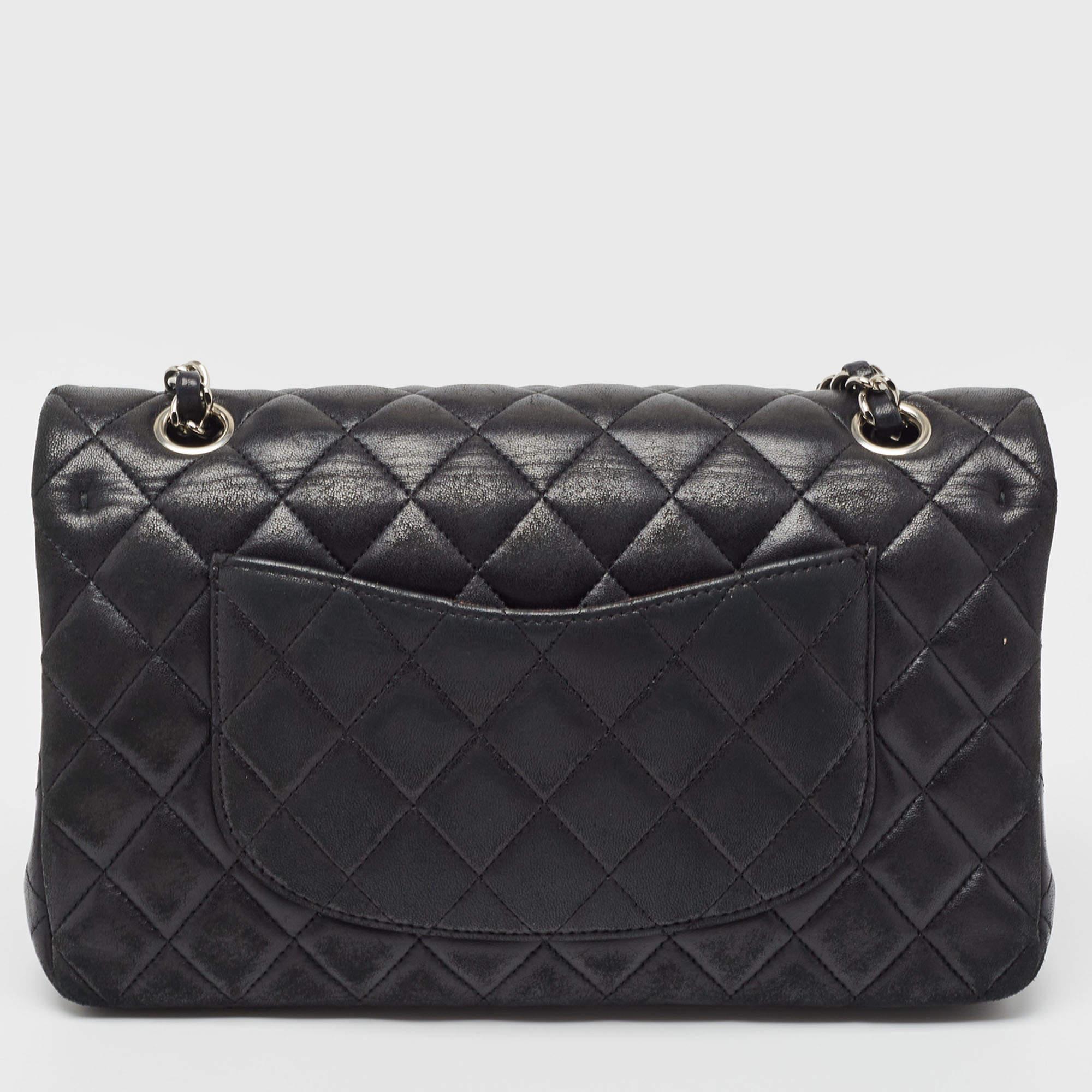 Chanel's luxurious Double Flap bag is a must-have in a well-curated wardrobe! This stunning bag has a masterfully crafted leather exterior with silver-tone hardware and the iconic CC logo to secure the flap.

