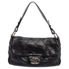 Chanel Kleine Chanel On the Road Klappentasche aus gestepptem Leder in Schwarz