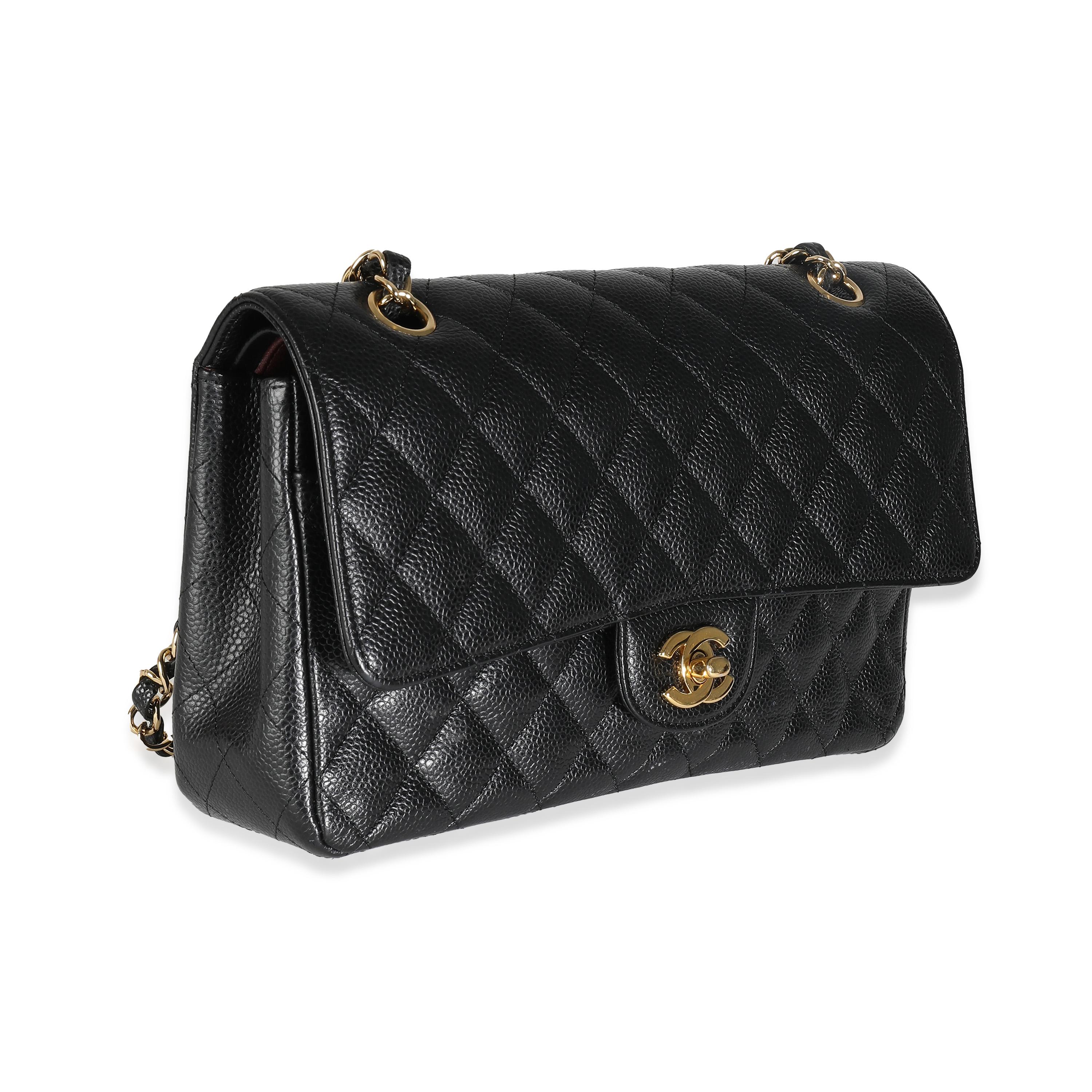 Listing Title: Chanel Black Quilted Caviar Medium Classic Double Flap Bag
SKU: 138402
Condition: Pre-owned 
Condition Description: A timeless classic that never goes out of style, the flap bag from Chanel dates back to 1955 and has seen a number of