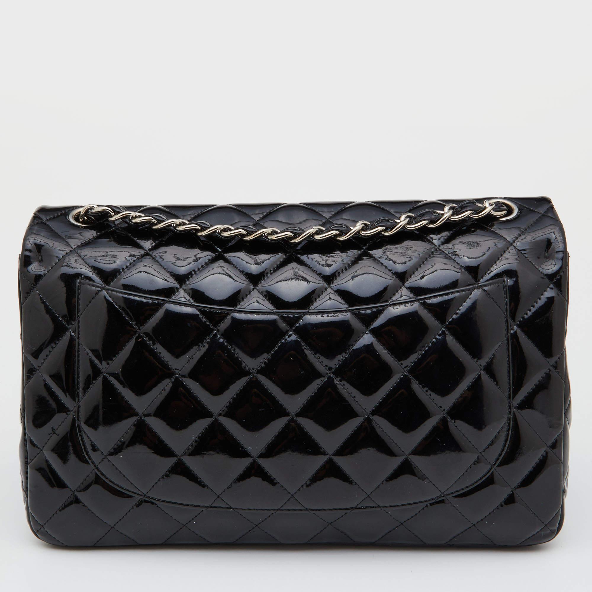We're bringing Chanel's iconic Classic Flap bag to your closet with this creation. Exquisitely crafted from patent leather in their quilt design, it bears the signature label inside the leather interior and the iconic CC turn-lock on the flap. The