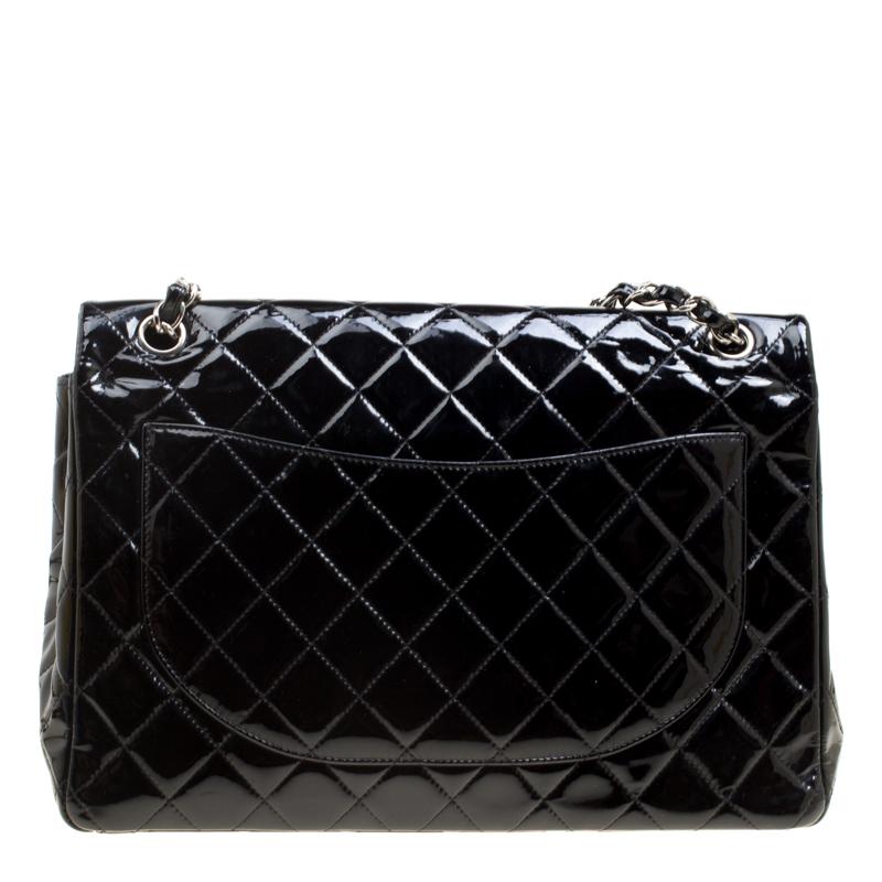 We are in absolute awe of this Classic Double Flap bag from Chanel as it is appealing in a surreal way. With a patent leather exterior that is detailed with their signature quilt, the black bag brings forth a fine unison of fashion, art, and beauty.