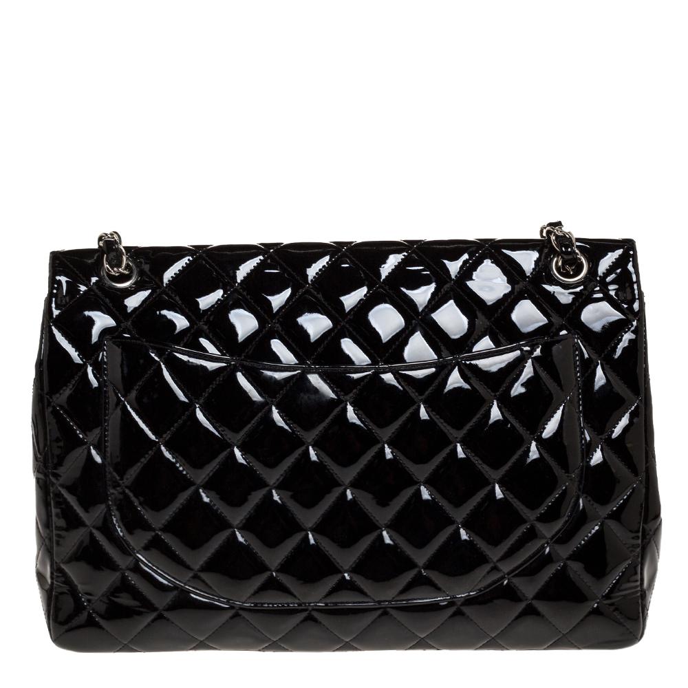 We are in utter awe of this flap bag from Chanel as it is appealing in a surreal way. Exquisitely crafted from glossy patent leather in their quilt design, it bears their signature label on the leather interior and the iconic CC turn-lock on the