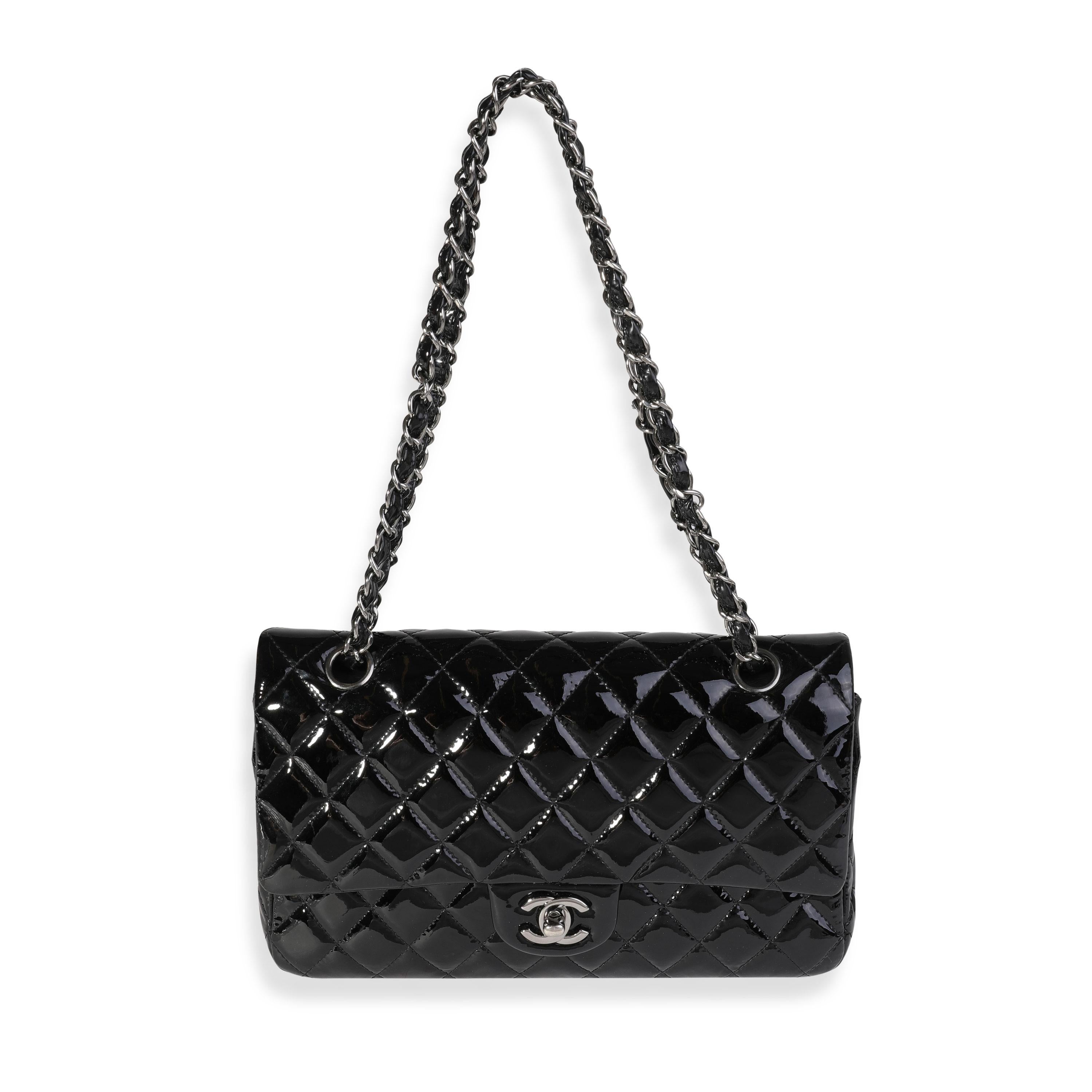 Listing Title: Chanel Black Quilted Patent Leather Medium Classic Double Flap Bag
SKU: 121324
MSRP: 8800.00
Condition: Pre-owned 
Handbag Condition: Good
Condition Comments: Good Condition. Light scuffing throughout exterior. Scratching to hardware.