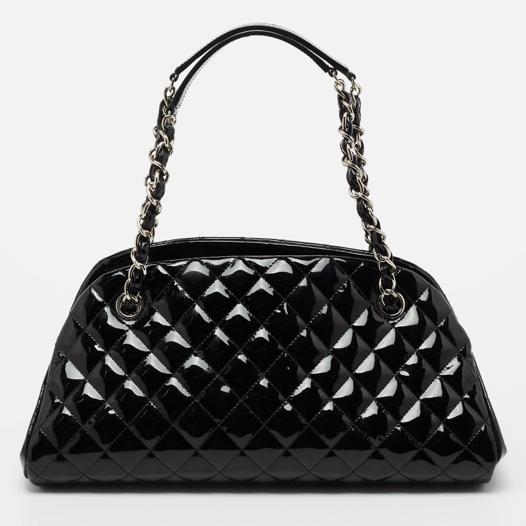 The Just Mademoiselle is another loved bag from Chanel. Crafted from patent leather, this beauty in black is lined with canvas and held by chain handles. This bag has well-sized compartments for your necessities and a CC charm for you to flaunt.

