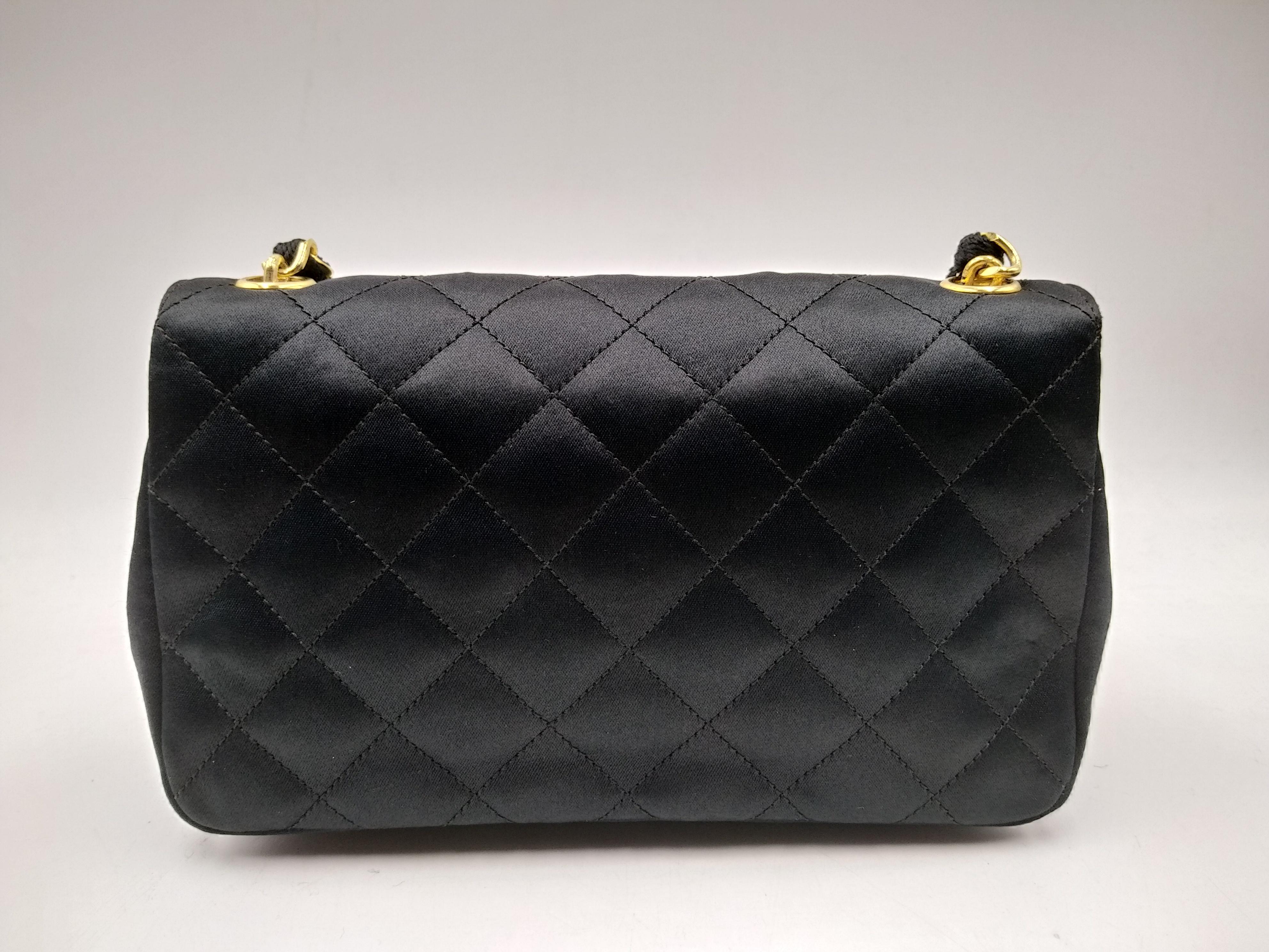 Women's or Men's Chanel Black Quilted Satin Mini Flap Bag with Gold Hardware For Sale