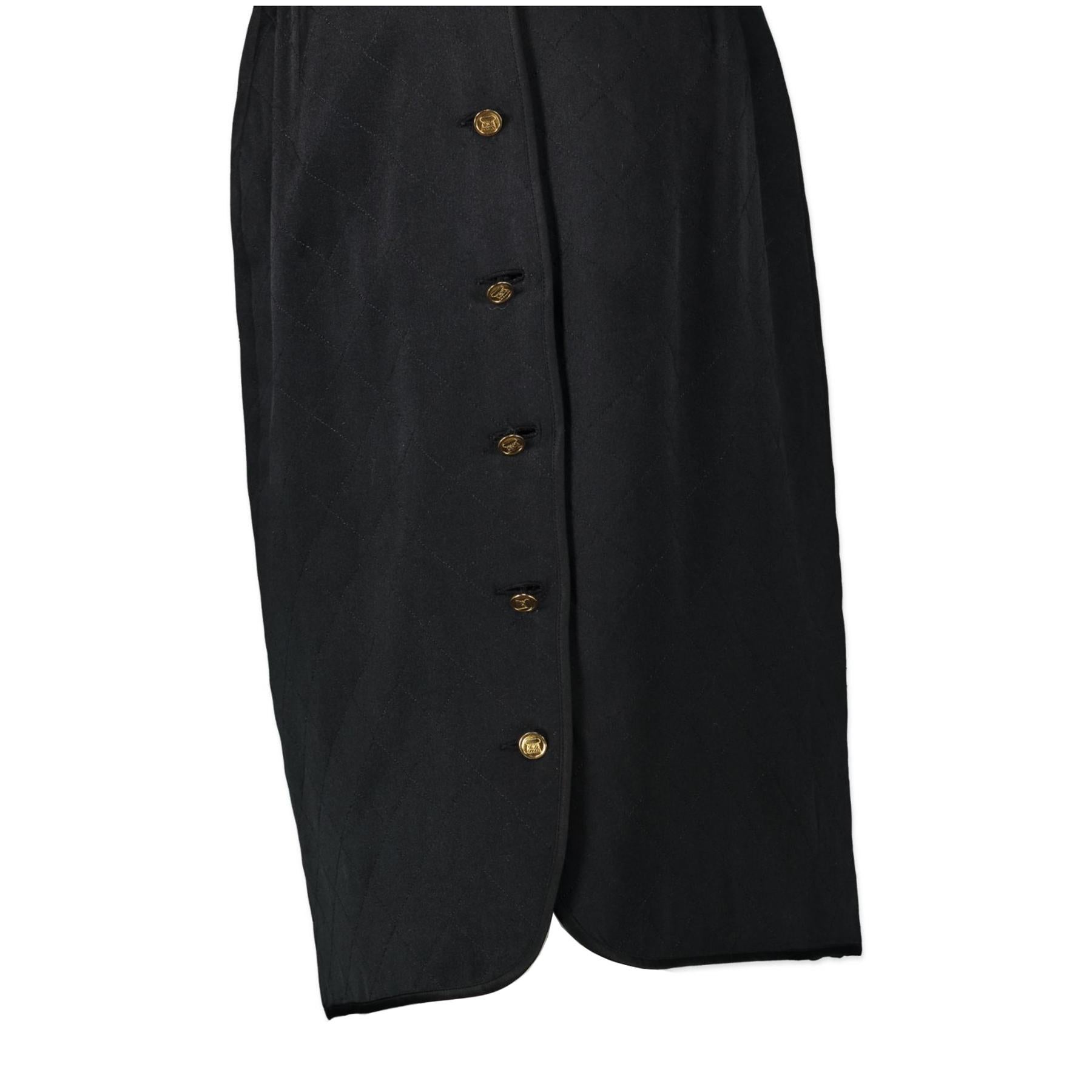 Very good preloved condition

Chanel Black Quilted Satin Skirt 

This gorgeous quilted Chanel skirt will be the perfect addition to your closet. It's a classic piece but the silk fabric gives it a shiny twist. The skirt also features gold buttons