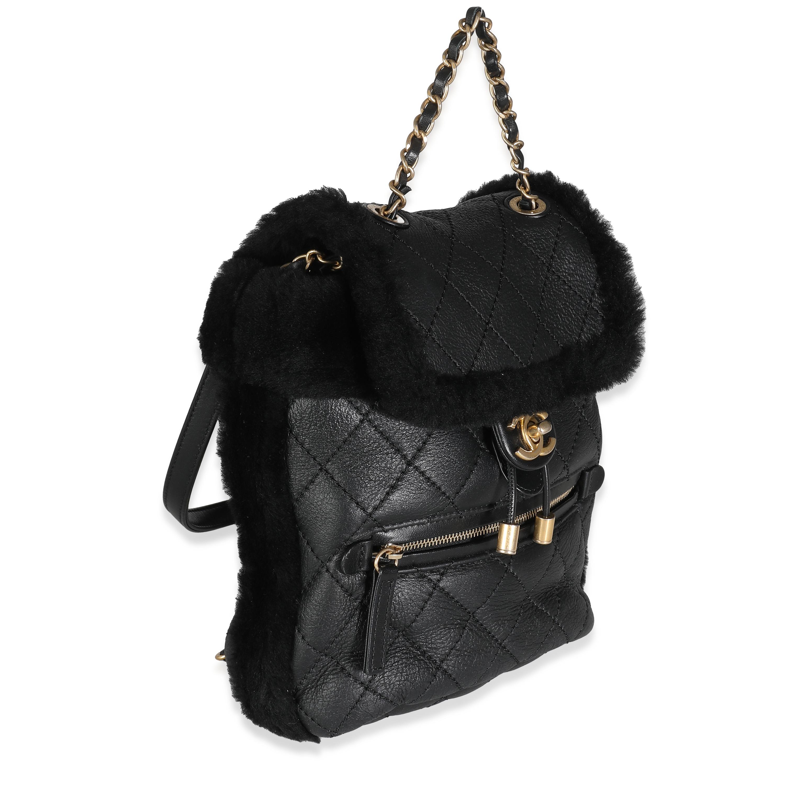 Chanel Black Quilted Shearling Paris Hamburg Small Backpack In Excellent Condition For Sale In New York, NY
