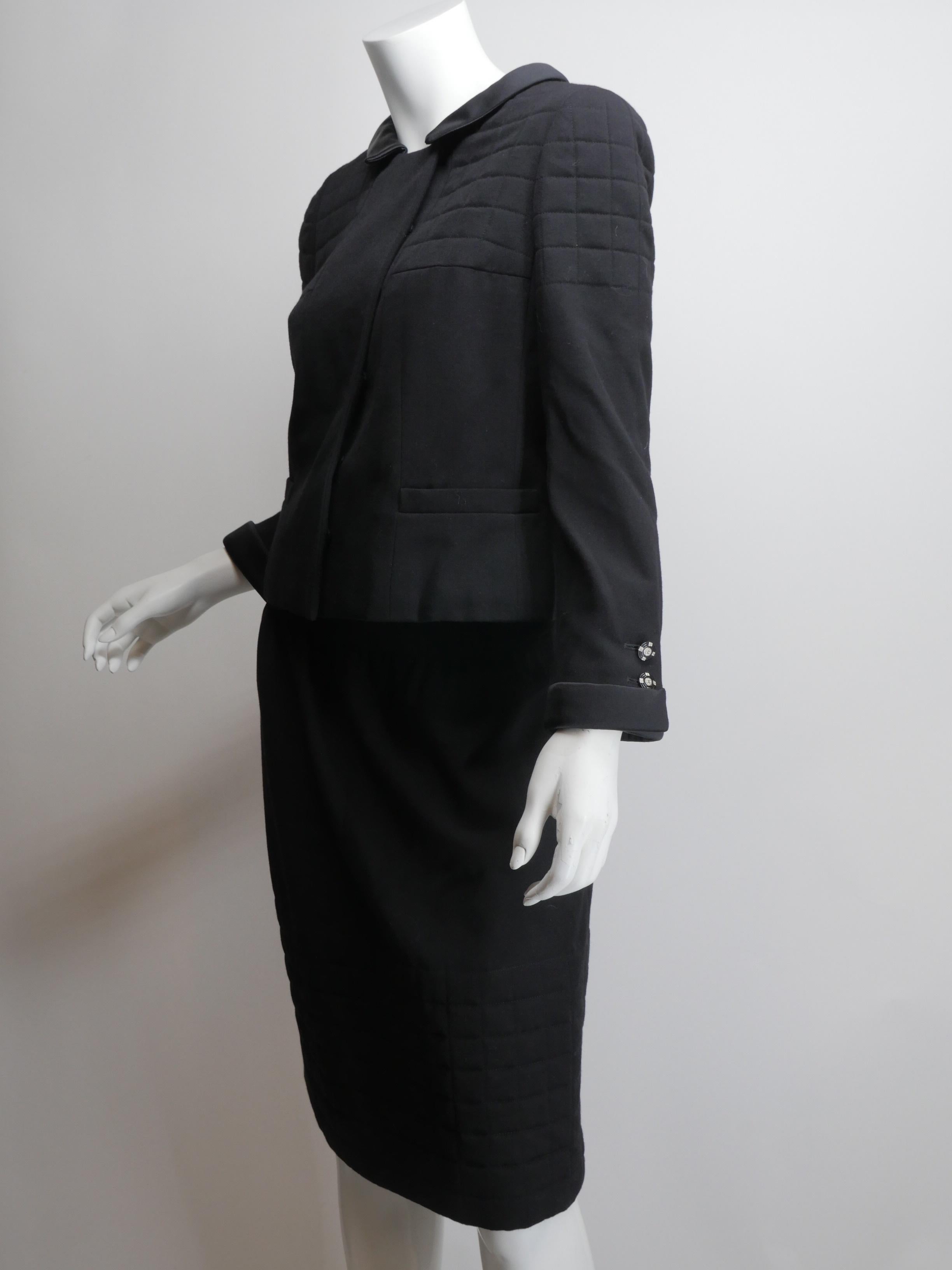 Chanel Skirt Suit. Black Jacket with Button Closure, Quilted Detail & Knee Length A-Line Skirt.