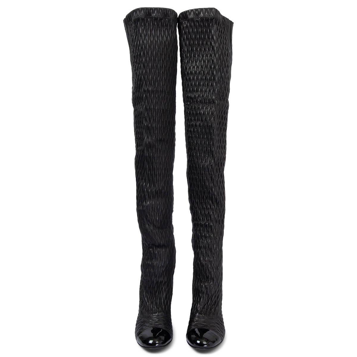 100% authentic Chanel quilted over-knee boots in black stretchy lambskin with a black patent leather heel and tip. Have been worn once or twice and are in virtually new condition. Come with dust bag. 

Measurements
Imprinted Size	36.5
Shoe
