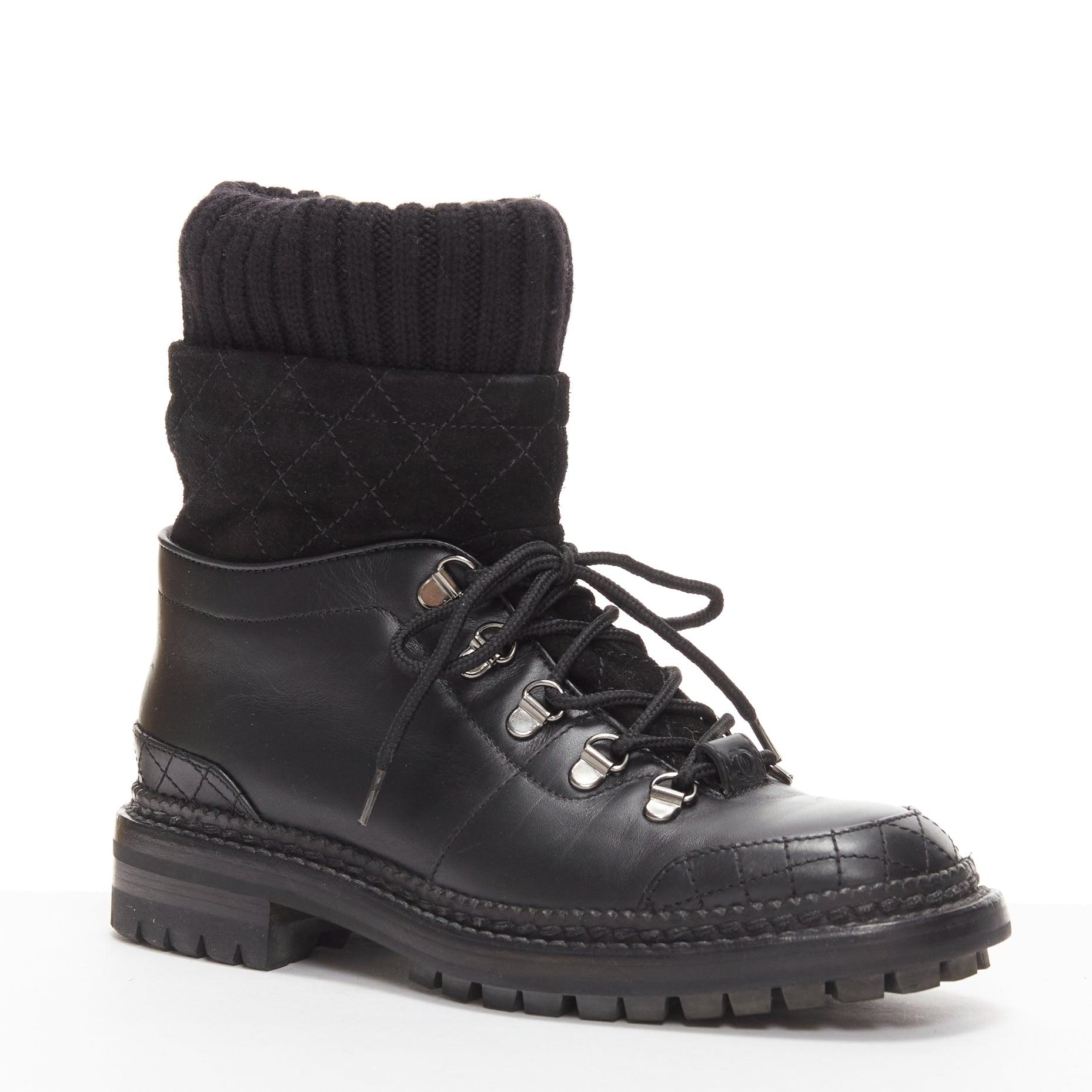 CHANEL black quilted trim CC logo tromp loeil sock ankle boots EU38
Reference: TGAS/D01100
Brand: Chanel
Designer: Karl Lagerfeld
Material: Leather, Fabric
Color: Black, Silver
Pattern: Solid
Closure: Lace Up
Lining: Black Leather
Extra Details: CC