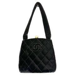 Chanel black quilted velvet handbag