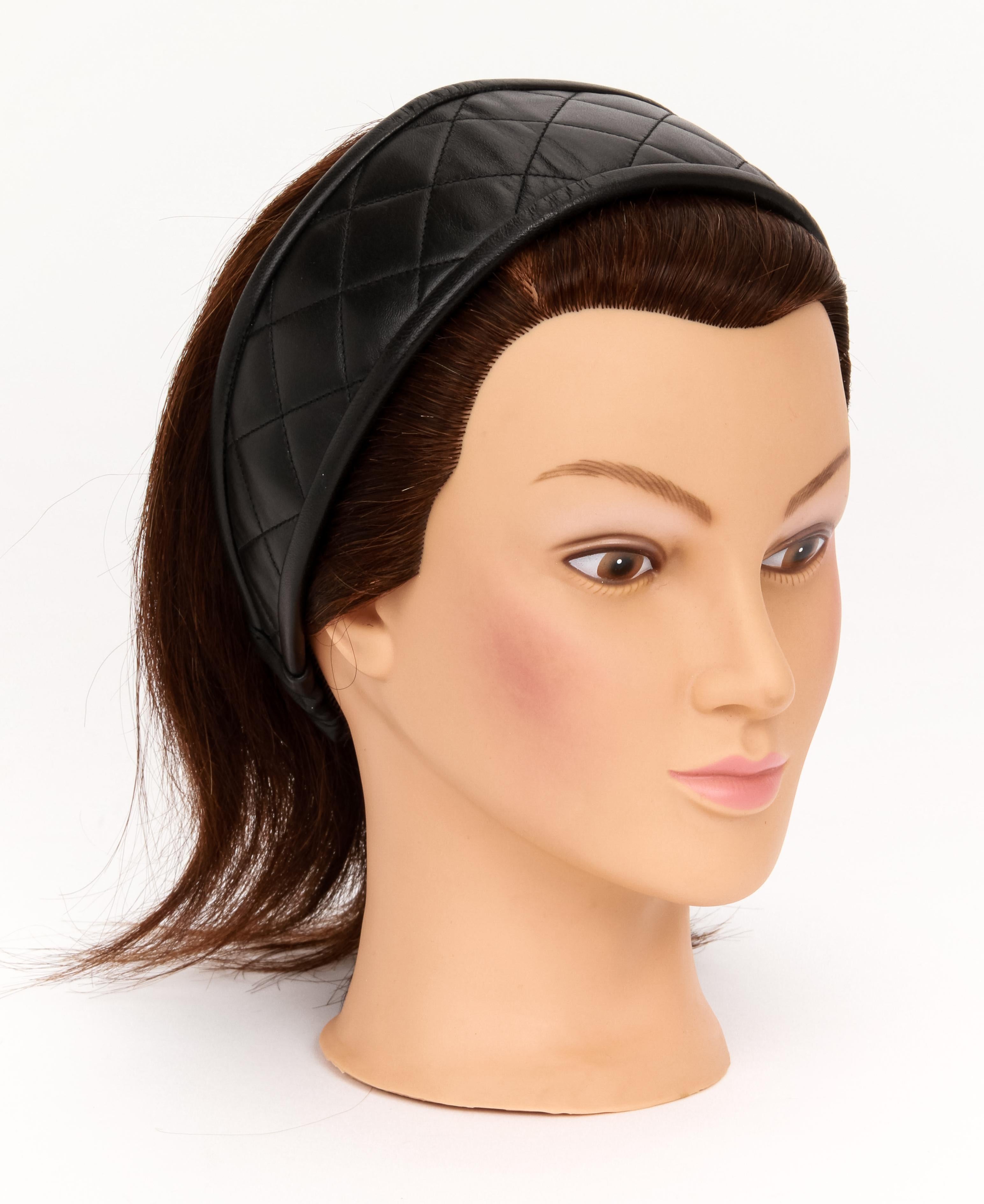 Chanel rare and collectible black quilted headband. Black, white and platinum lambskin. Excellent condition with original tag. One size fits all. Comes with original dust cover.