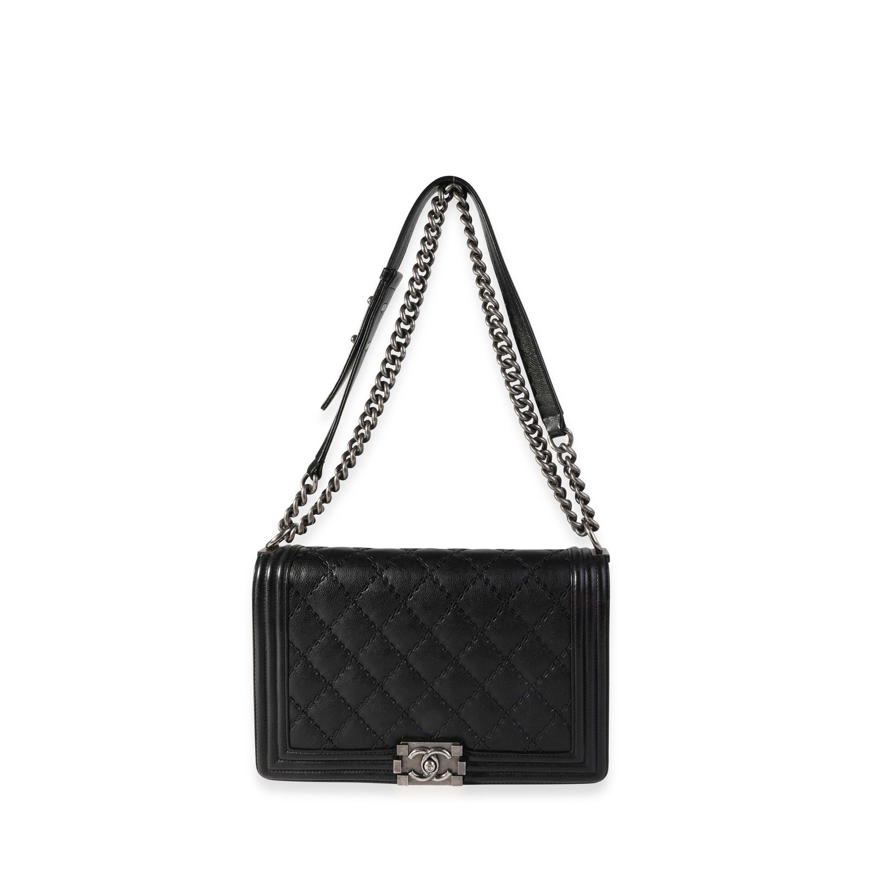 Listing Title: Chanel Black Quilted Whipstitch Calfskin New Medium Boy Bag
SKU: 118569
Condition: Pre-owned (3000)
Handbag Condition: Very Good
Condition Comments: Very Good Condition. Scuffing to corners and interior leather. Marks on interior