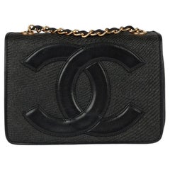 Chanel Black Raffia 
Lambskin Leather Vintage Mini Timeless Single Flap Bag