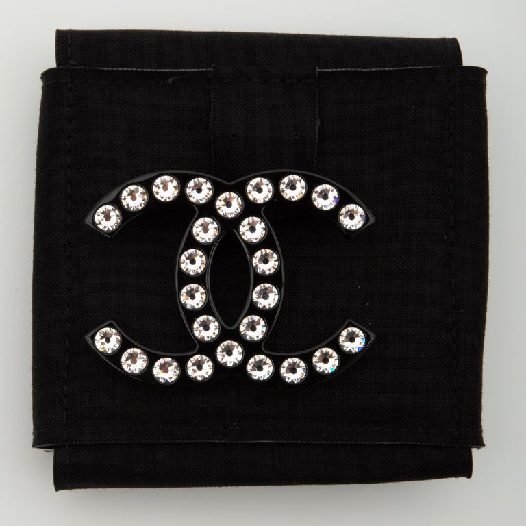 Chanel Black Resin Crystal CC Brooch (2021) at 1stDibs  black chanel brooch,  chanel logo brooch, chanel brooch 2021