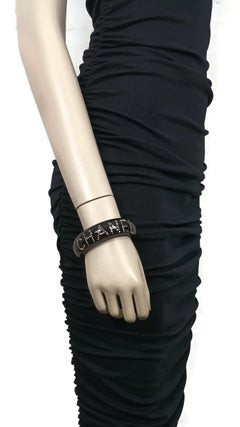 CHANEL Black Resin Crystal Logo Inlaid Wide Bangle Bracelet Fall 2003