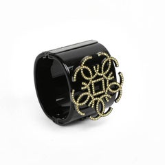 Chanel Black Resin Cuff With CC Logo Yellow Rhinestones