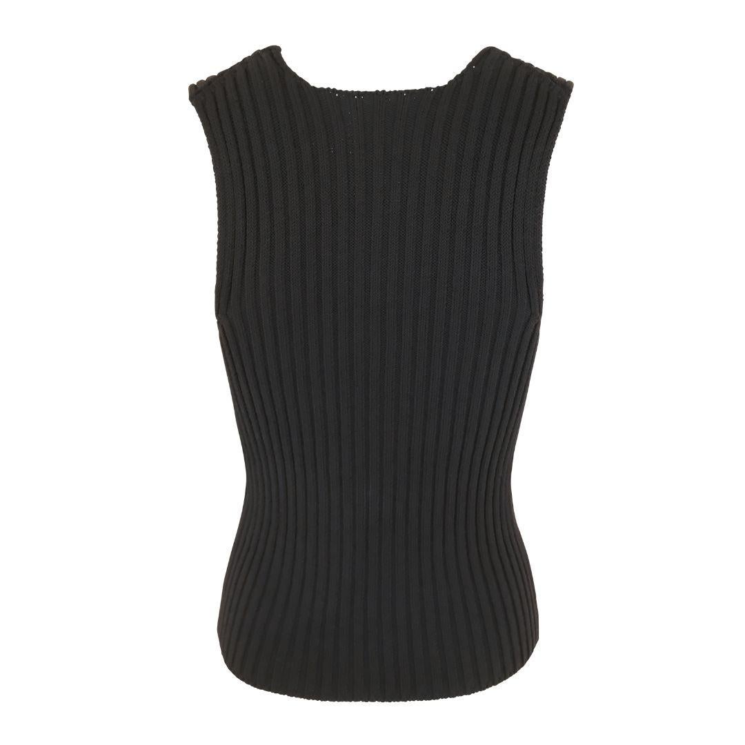 Classic heavy rib knit sleeveless black sweater tank top with plunging scoop neck. Features a metal logo button detail located at the front left hemline.

Slim fit silhouette. Soft cotton blend weave with durable weight.

Condition Details: