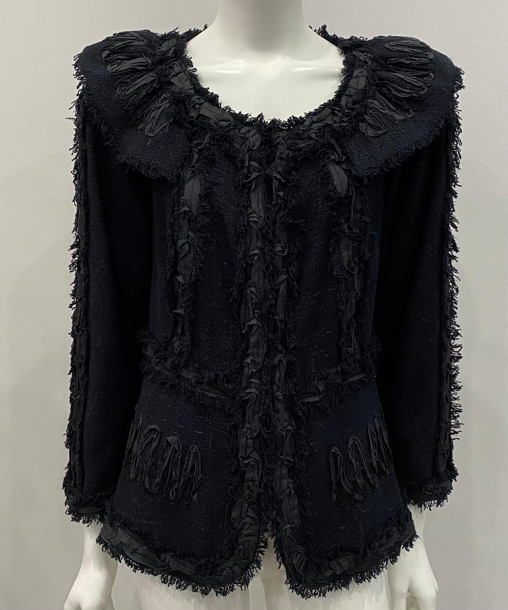 Chanel Black Ribbon and Cording Appliqué Cotton Blend Jacket with matching skirt. Size 40 - 2009P Collection. This fabulous Chanel Jacket is 95% cotton, fully lined in a black silk CC and camellia print with the iconic silver chain at the inside