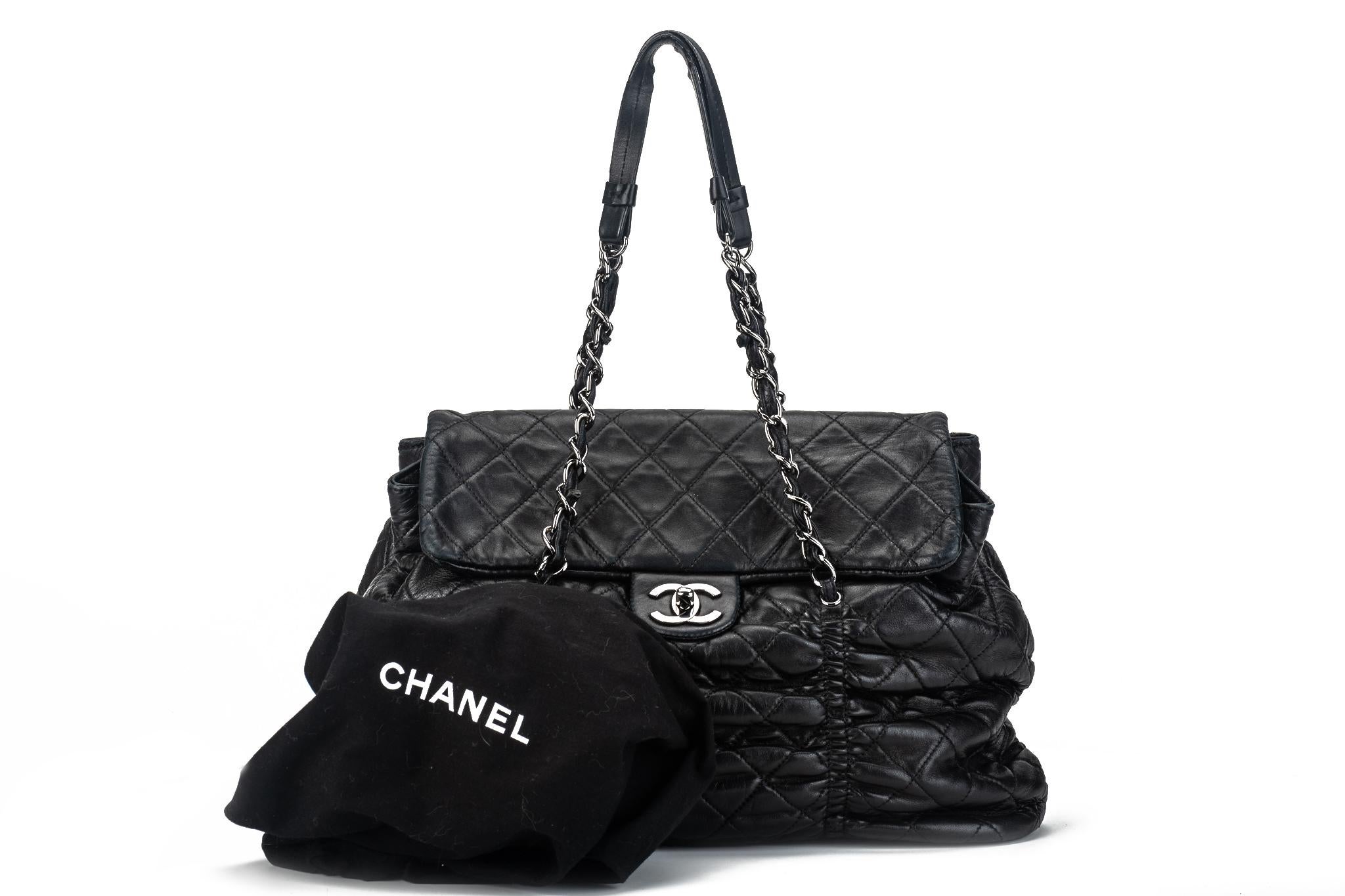 Chanel black rouched soft lambskin leather shoulder bag with silver tone hardware. Very good condition on leather , minor frying on leather strap edges. Shoulder drop 7
