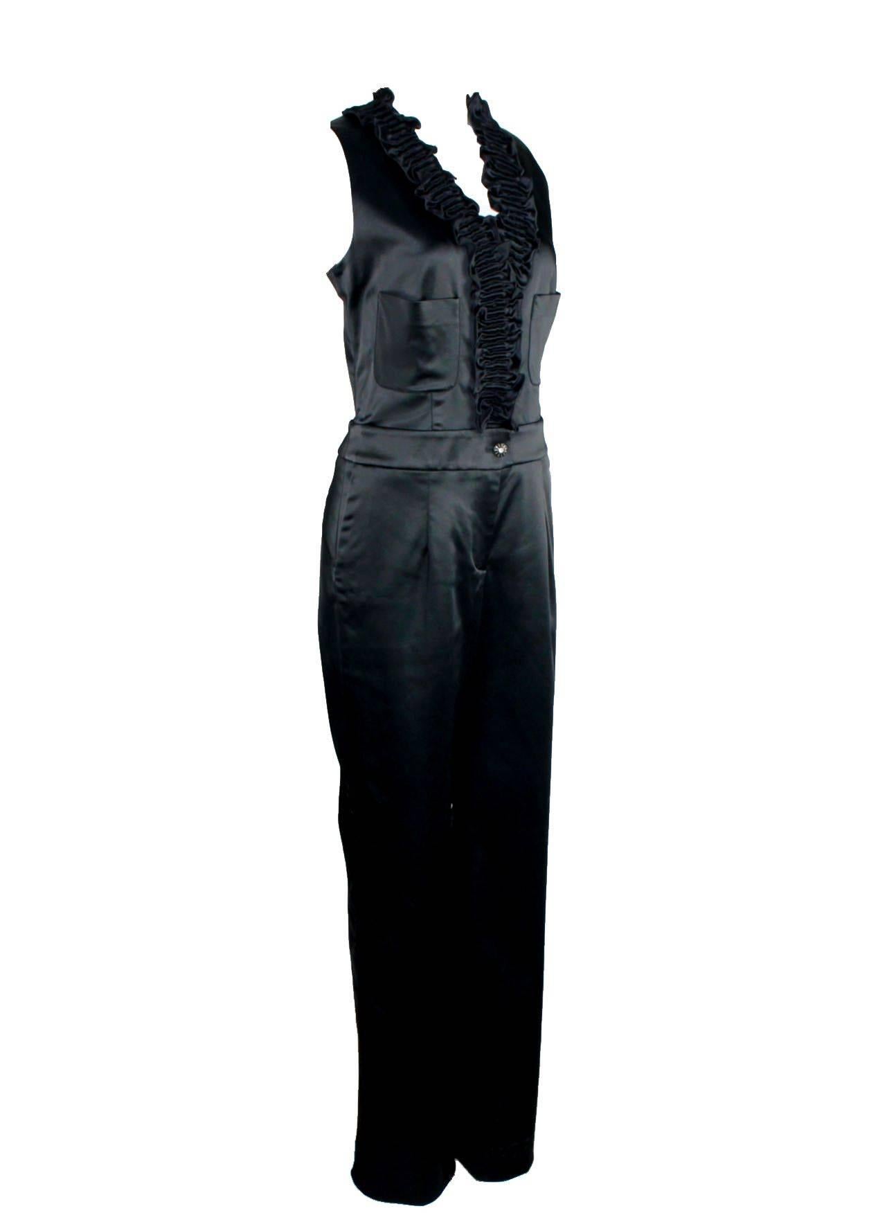 Chanel's tuxedo jumpsuit is a modern take on tailoring. Cover up by day with a cropped jacket, adding a sculpting waist belt and platform heels for an impeccably sharp after-dark silhouette.

Stunning Chanel jumpsuit
A signature piece that will last