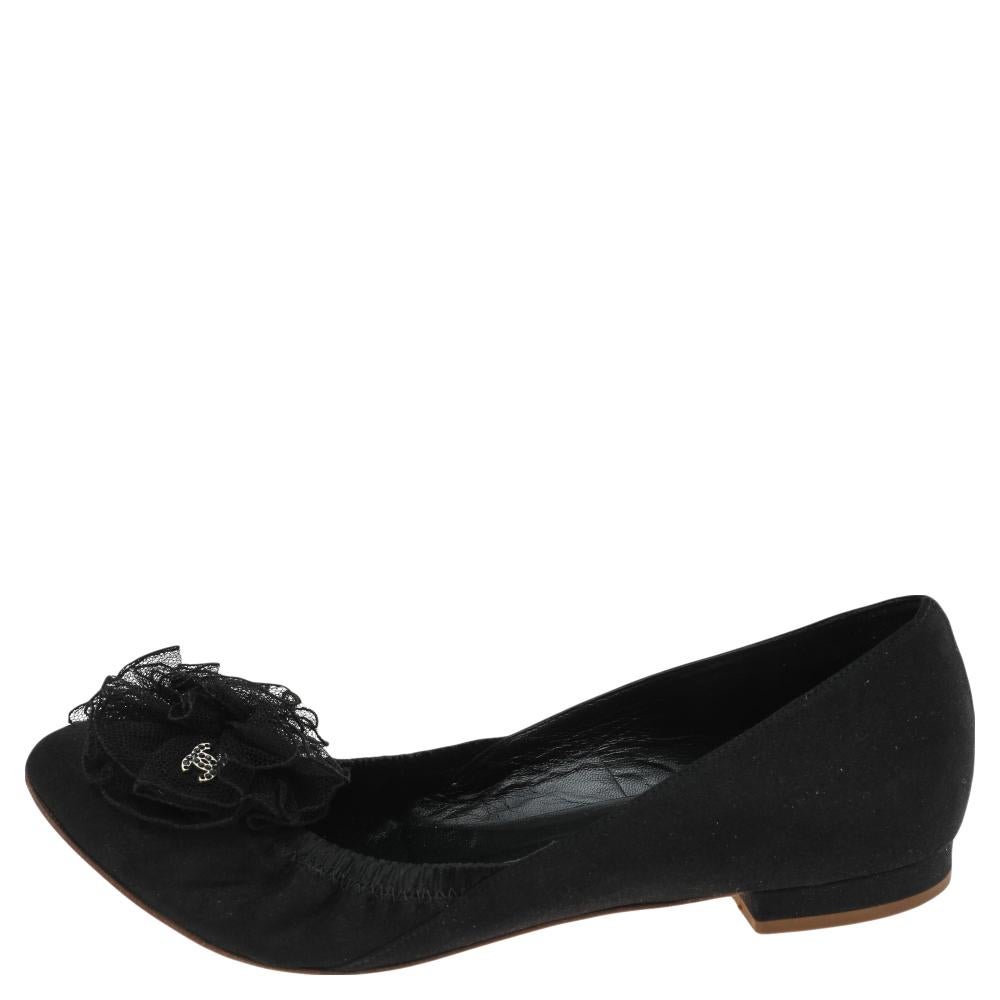 You would never want to take off these comfortable Chanel ballet flats. They are crafted from black satin and designed with pretty flowers on the uppers and leather insoles for all-day ease.