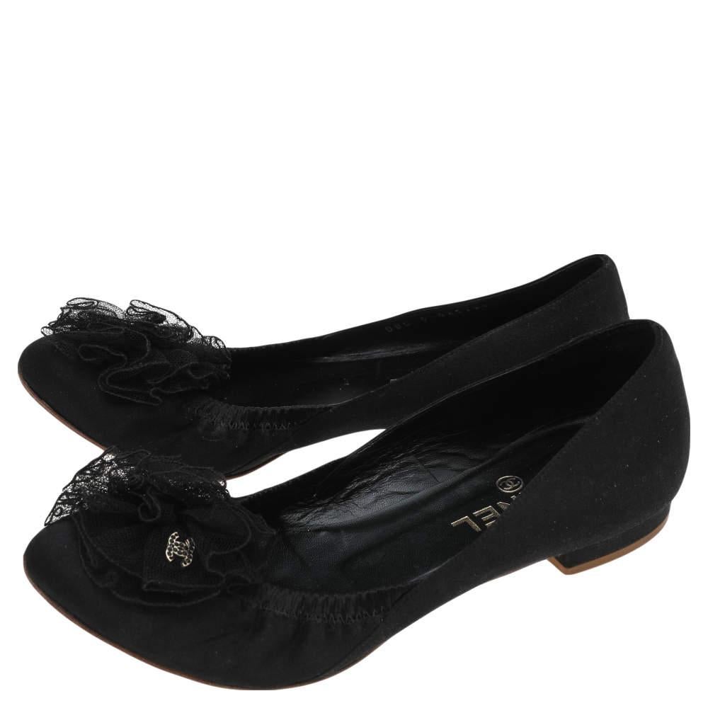 You would never want to take off these comfortable Chanel ballet flats. They are crafted from black satin and designed with pretty flowers on the uppers and leather insoles for all-day ease.

