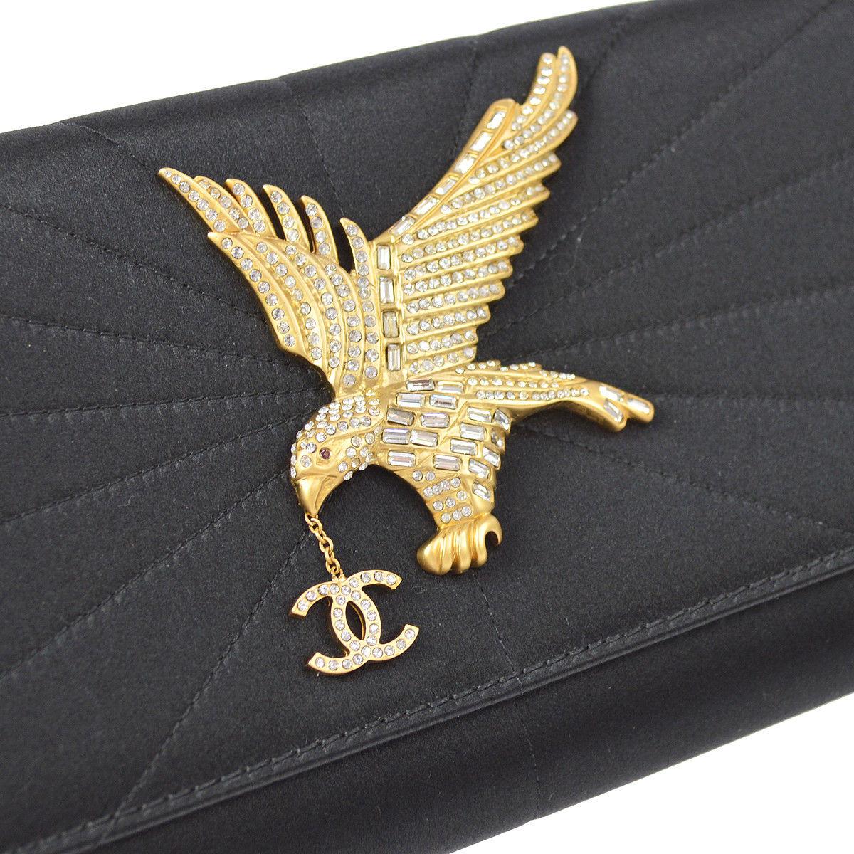 Chanel Black Satin Gold Rhinestone Bird Charm Evening Clutch Shoulder Flap Bag in Box

Satin
Rhinestone
Leather lining
Magnetic closure
Made in Italy
Shoulder strap drop 8.75