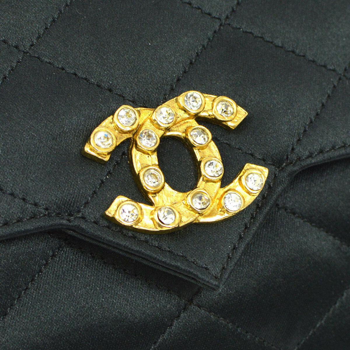 Chanel Black Satin Gold Rhinestone Evening Party Small Clutch Shoulder Flap Bag in Box 
Satin
Rhinestone
Gold tone hardware
Satin lining
Date code present
Shoulder strap drop 20