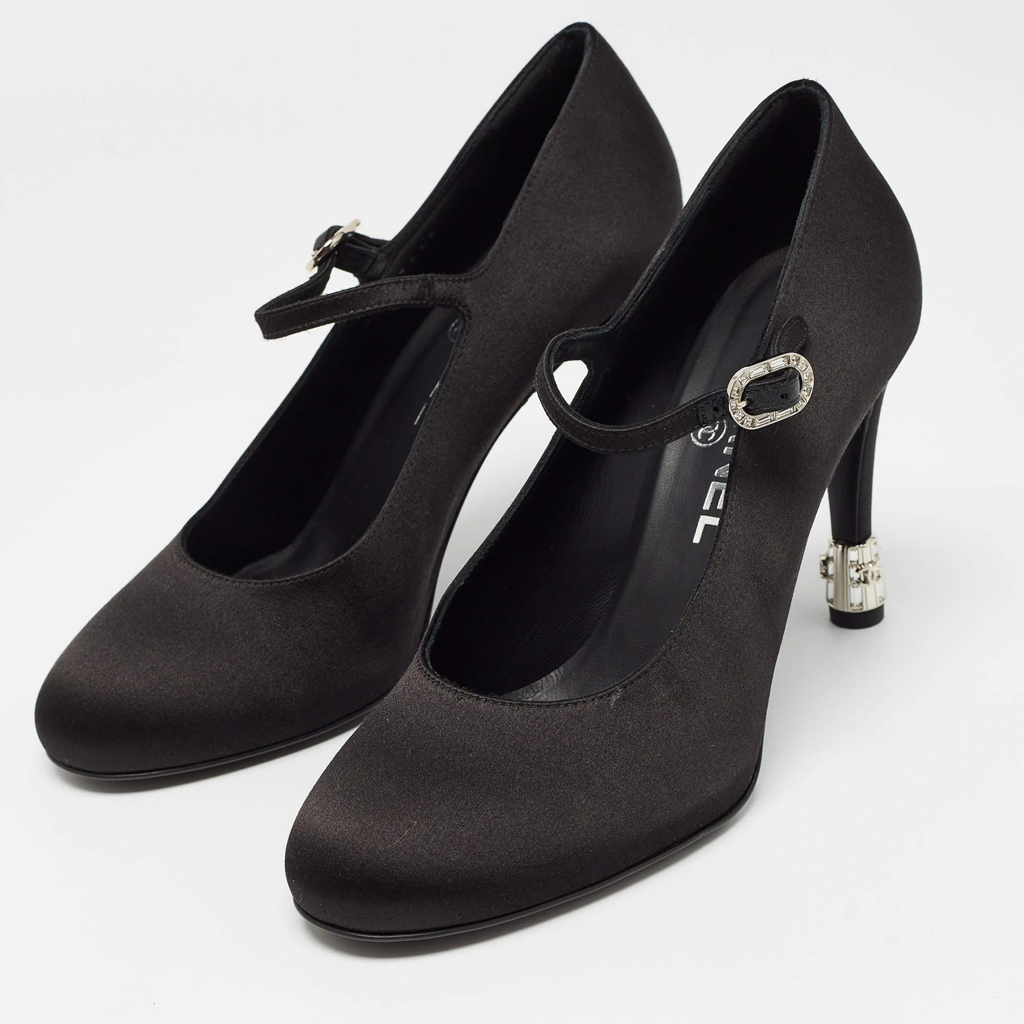 Crafted with exquisite precision, the Chanel CC pumps exude timeless allure. The sleek black satin envelops your feet in luxurious comfort, while the iconic interlocking CC logo adorns the heels, adding a touch of unmistakable elegance. Perfect for