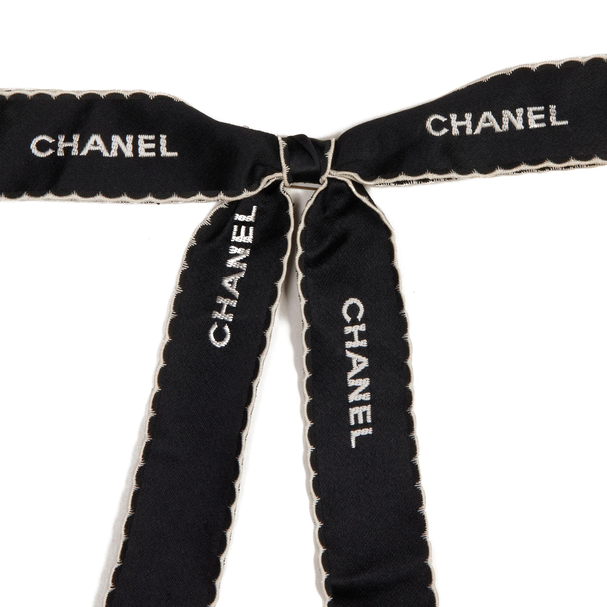 Chanel BLACK SATIN VINTAGE RIBBON PIN

CONDITION NOTES
The exterior is in very good condition with minimal signs of use.
The hardware is in very good condition with light signs of use. The Hardware shows slight signs of tarnishing.
Overall this item