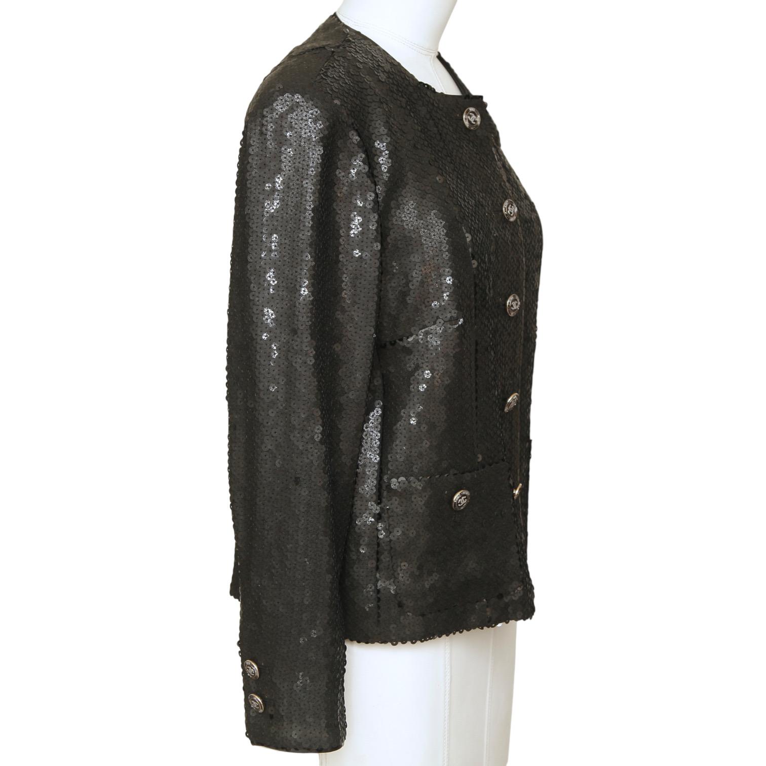 GUARANTEED AUTHENTIC CHANEL CRUISE 2023 MONTE CARLO BLACK SEQUIN JACKET

Retail excluding sales taxes $8,800.
Sold Out.

Details:
• Classic fit, sequin/paillette design.
• Collarless.
• CC gem buttons.
• Front pockets.
• Long sleeve.
• Fully lined,