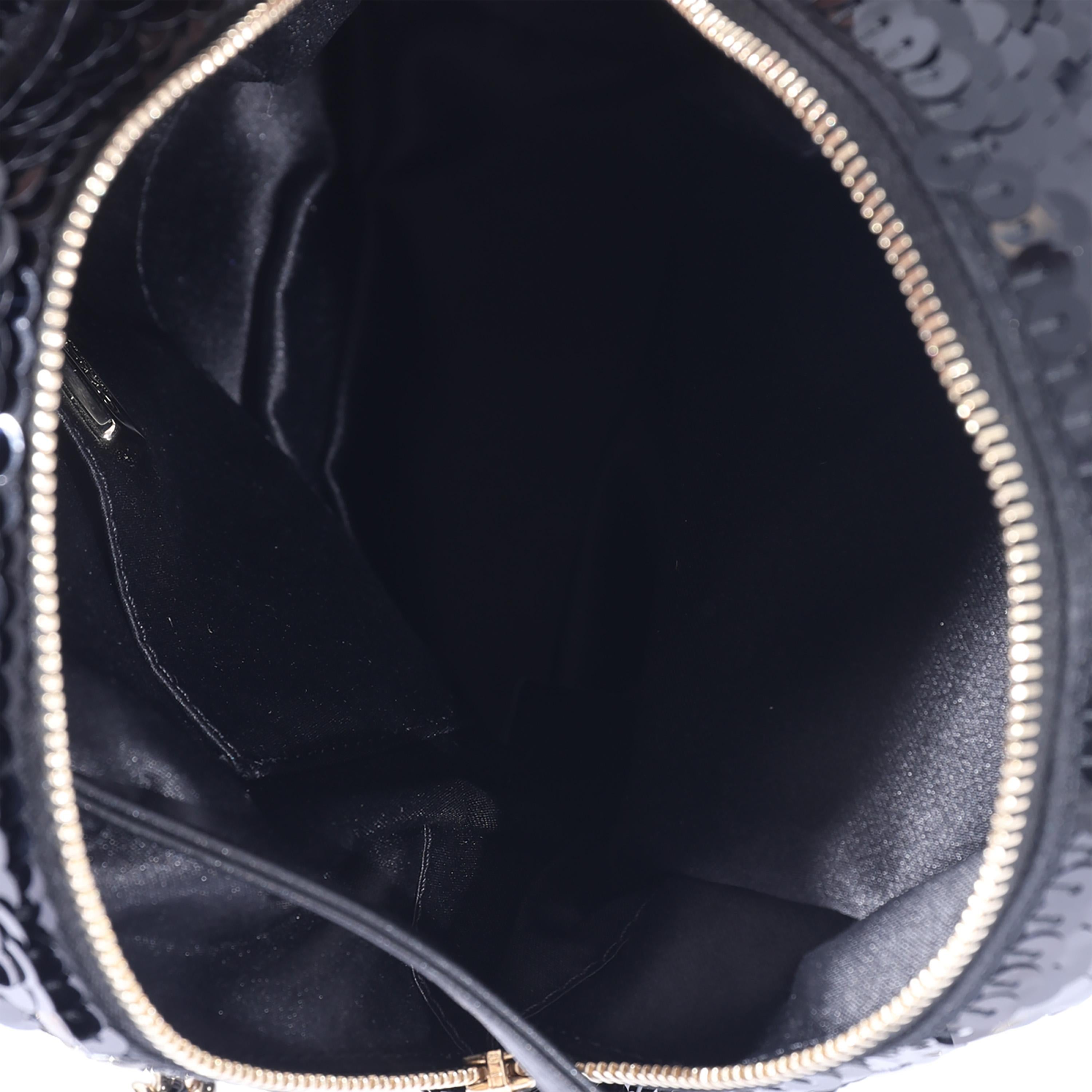 Listing Title: Chanel Black Sequin & Lambskin Small Backpack
SKU: 127888
Condition: Pre-owned 
Handbag Condition: Very Good
Condition Comments: Very Good Condition. Light scuffing to corners and lambskin. Light scuffing to interior leather.
Brand: