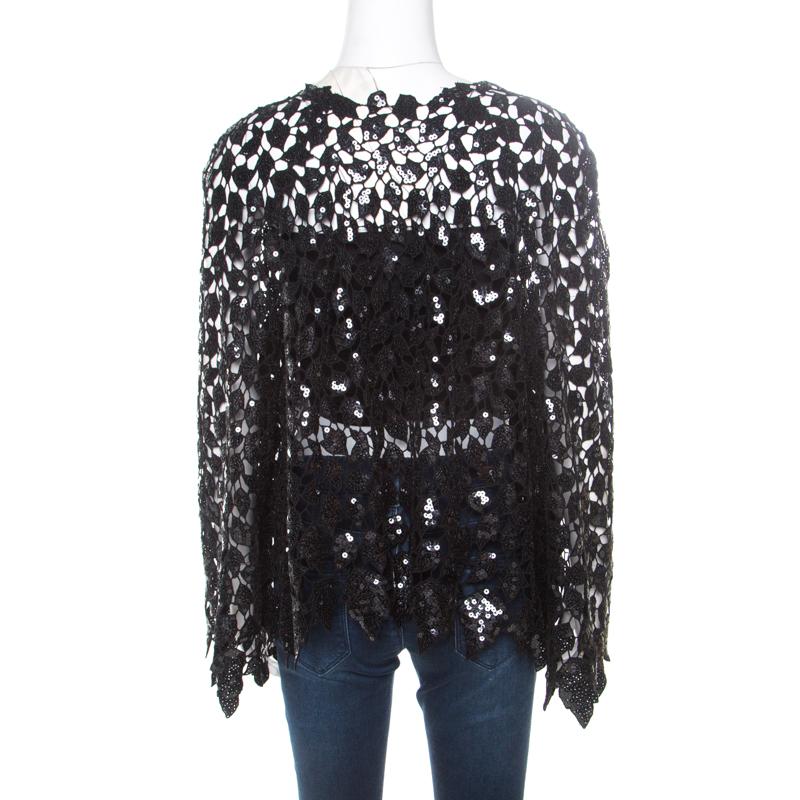 We have set our hearts on this gorgeous jacket from Chanel as it is simply covered in beauty! It comes with cutouts on Guipure lace, long sleeves and sequins embellished all over for a shimmery touch. You'll look fabulous when you assemble this