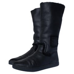 Chanel, Black shearling boots