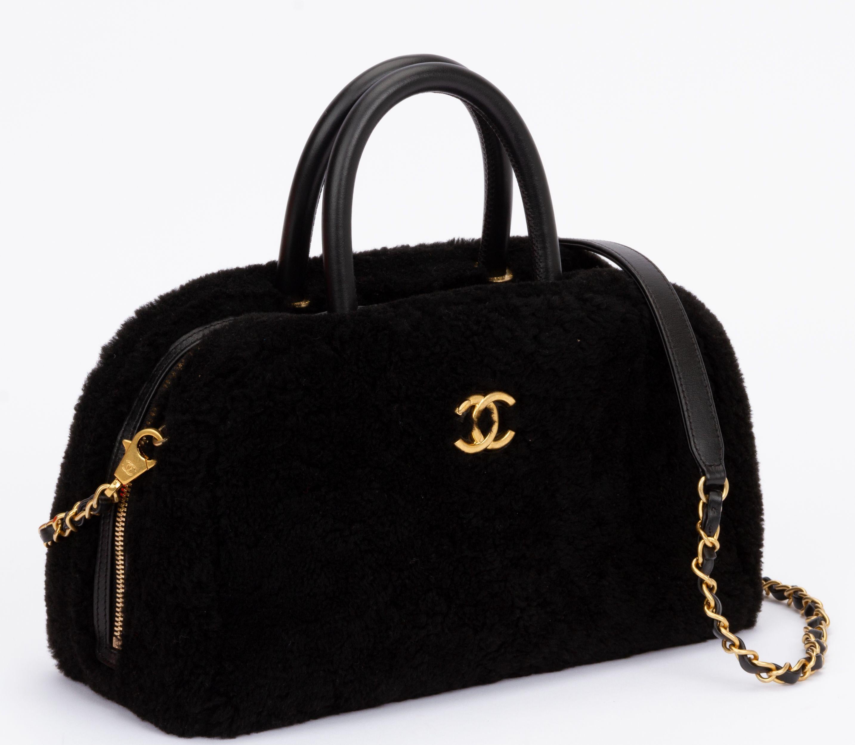 Chanel mint condition black shearling bowler bag with detachable strap . Detachable shoulder strap (drop 19
